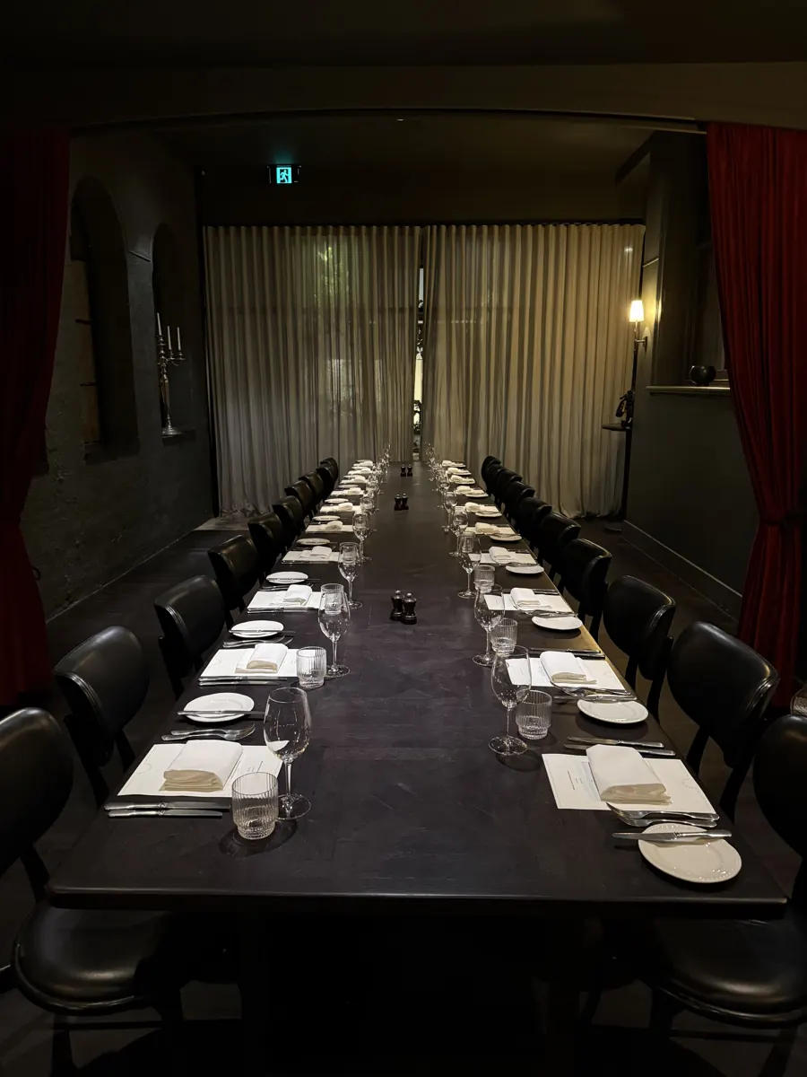 Long table set for dinner in a private dining room